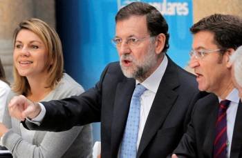 Mariano Rajoy, Dolores de Cospedal y Alberto Núñez Feijóo, esta mañana en Santiago de Compostela. Foto: Lavandeira