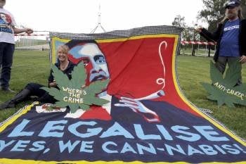 Cartel con un dibujo de Obama fumando un porro de marihuana. (Foto: ARCHIVO)