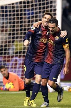 Messi y Xavi celebran un gol. (Foto: NACHO GALLEGO)