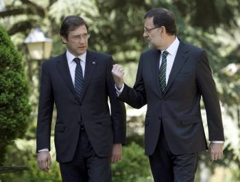 El primer ministro portugués, Pedro Passos Coelho, y el presidente del Gobierno, Mariano Rajoy. (Foto: S. BARRENECHEA)