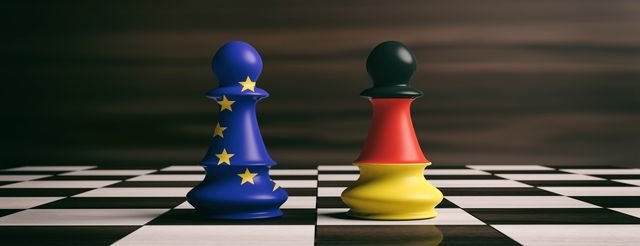 Germany and EU cooperation concept.Germany and European Union flags on chess pawns soldiers on a chessboard. 3d illustration