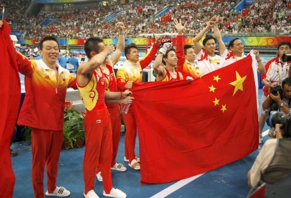 La selección china festeja la medalla de oro.