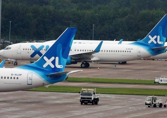 Aviones pertenecientes a la flota de XL Airways parados en las pistas del aeropuerto de Manchester (Foto: EFE)
