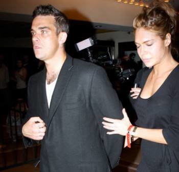 Robbie Williams y Ayda Field.