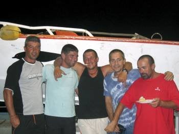 Imagen de archivo de cuatro de los marineros gallegos que estuvieron retenidos.