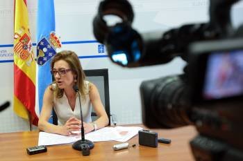 La conselleira de Hacienda, Marta Fernández Currás, presentando el avance de las cuentas gallegas para 2011.