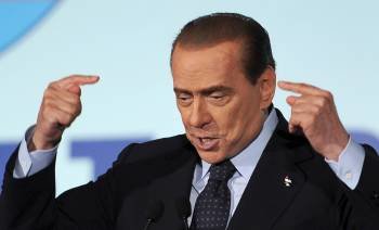 Berlusconi en una convención de los confundadores del partido Pueblo de la Libertad (PDL). (Foto: CLAUDIO ONORATI)
