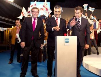Feijóo, con el candidato lucense Jaime Castiñeiras y José Manuel Barreiro.