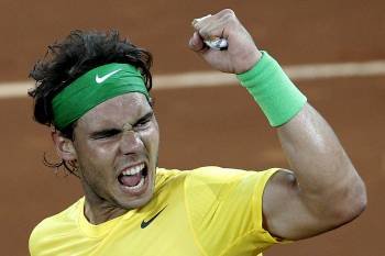 Nadal celebra la victoria en la primera semifinal sobre el suizo Federer, en Madrid.? (Foto: juanjo martín)