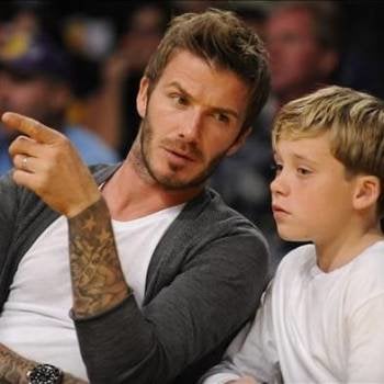 David Beckham y su hijo Brooklyn en un partido de los Lakers