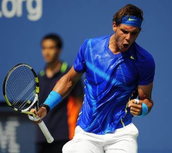 Rafa Nadal celebra uno de los puntos ganadores durante el partido ante Nalbandian. (Foto: A. GOMBERT)