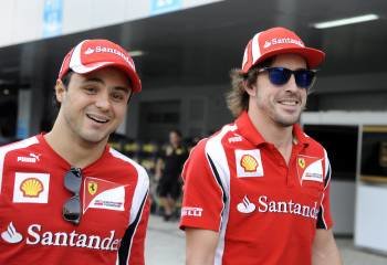 Fernando Alonso acompañado de Felipe Massa (Foto: EFE)