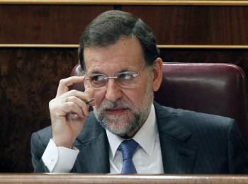 El líder del PP, Mariano Rajoy, durante una de sus intervenciones esta mañana en el pleno del Congreso de los Diputados que hoy aprobará su investidura como presidente del Gobierno. (Foto: EFE)