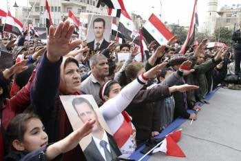 Seguidores de Bashar el Asad. (Foto: YOUSSEF BADAWI)