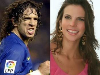 Carles Puyol y Giselle Lacouture (Foto: Archivo EFE)