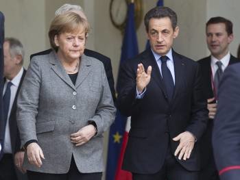 Sarkozy con Merkel (Foto: EFE)