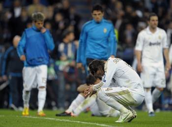 Los jugadores del Real Madrid muestran su tristeza al ser eliminados de la Liga de Campeones. (Foto: PABLO GONZÁLEZ CEBRIÁN)