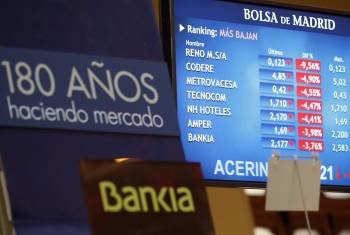 Panel de cotizaciones de la Bolsa madrileña. (Foto: CHEMA MOYA)