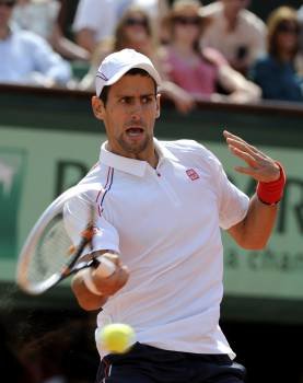 Djokovic, en la victoria sobre el italiano Starace. (Foto: YOAN VALAT)