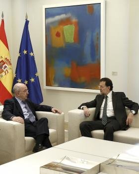 Rajoy y Almunia en la reunión de esta mañana.
