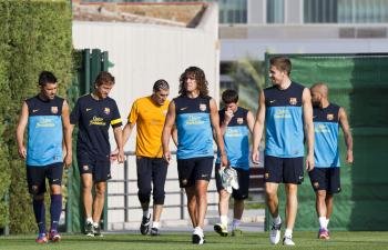 Messi y Puyol empiezan a trabajar con el grupo