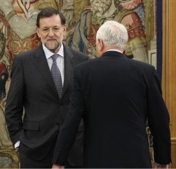 El presidente del Gobierno, Mariano Rajoy (i), junto al ministro de Asuntos Exteriores, José Manuel García-Margallo (Foto: EFE)