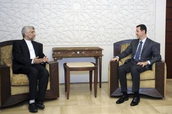 El secretario de Consejo Supremo iraní de Seguridad Nacional, Saeed Jalili y Bashar al Assad.