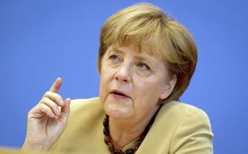 La canciller alemana, Angela Merkel, durante su extenso encuentro con los medios. (Foto: MICHAEL KAPPELER)