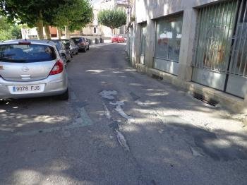 Estado en que se encuentra el firme de la calle Real, en Porto da Barca.