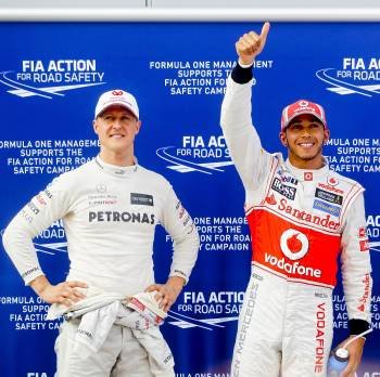 Hamilton, junto a Schumacher en Malasia. (Foto: DIEGO AZUBEL)
