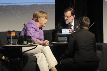 La canciller Ángela Merkel con Mariano Rajoy, en el encuentro que mantuvieron ayer en Chile. (Foto: PABLO OVALLE)