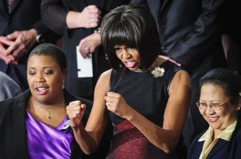 Michelle Obama sigue exultante el discurso del Estado de la Unión pronunciado por su marido. (Foto: PETE MAROVICH)