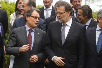 Rajoy y Mas, en la inauguración del Salón Internacional del Automóvil de Barcelona. (Foto: TONI GARRIGA)