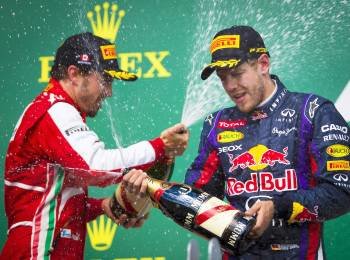 Alonso y Vettel, ayer durante la ceremonia del champán en el podio del GP de Canadá de Fórmula 1. (Foto: ANDRÉ  PICHETTE)