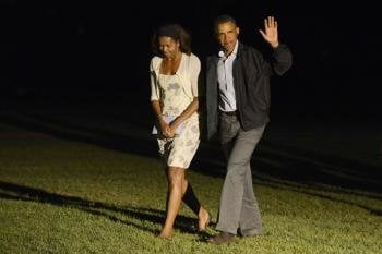 Barack Obama y su esposa regresan de sus vacaciones. (Foto: EFE)