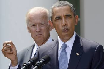 El presidente Obama, durante su intervención acompañado por el vicepresidente Joe Biden. (Foto: MICHAEL REYNOLDS)