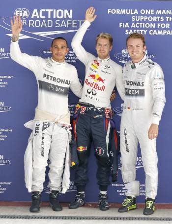 Hamilton (2º), Vettel (1º) y Rosberg (3º), tras la calificación. (Foto: HARISH TYAGI)