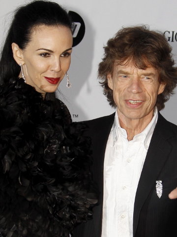 Mick Jagger con su novia la diseñadora de moda y modelo estadounidense, L&#39;Wren Scott en una foto de archivo