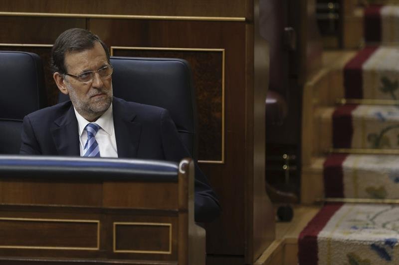 El presidente del Gobierno, Mariano Rajoy, durante el pleno del Congreso que aprobará la ley orgánica por la que se hace efectiva la abdicación del Rey