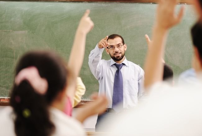 arabic kids in the school, classroom wit a teacher