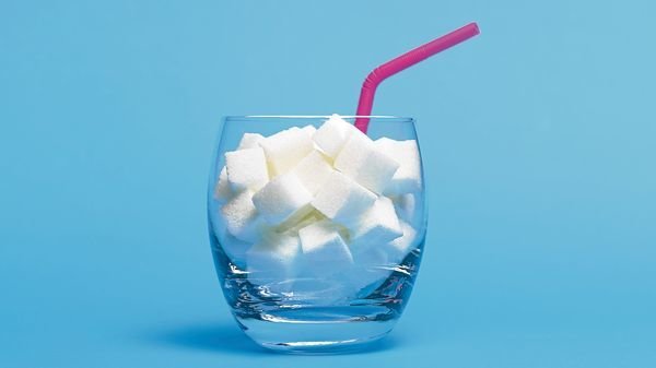An industry-funded study questions the evidence behind guidelines for daily sugar intake. Public health experts call the controversial findings an industry attempt to undermine scientific consensus.