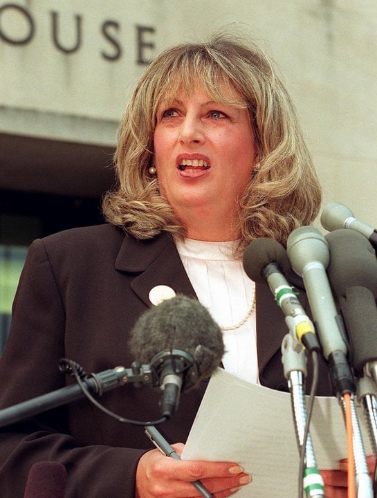 (FILES) In this file photo taken on July 29, 1998 Linda Tripp talks to reporters outside of the Federal Courthouse in Washington, DC, following her eighth day of testimony before the grand jury investigating the Monica Lewinsky affair. - Former White House employee Linda Tripp, whose taped conversations with then White House intern Monica Lewinsky triggered the probe into US President Bill Clinton leading to his eventual impeachment, died in April 8, 2020, US media reported. (Photo by WILLIAM PHILPOTT / AFP)