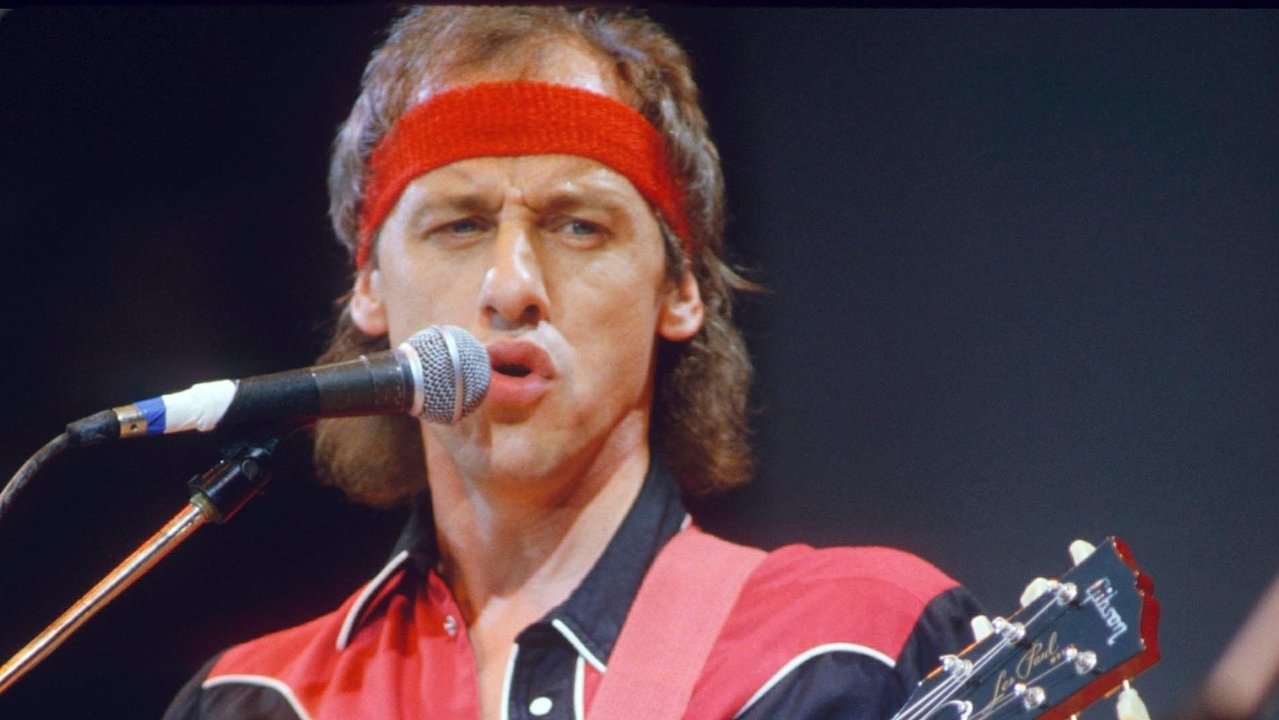 Mark Knopfler, durante el concierto de Wembley de 1985.